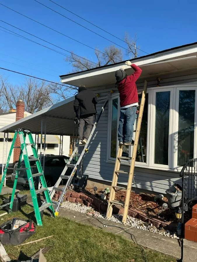 Restoration crew performing exterior repair in Broussard