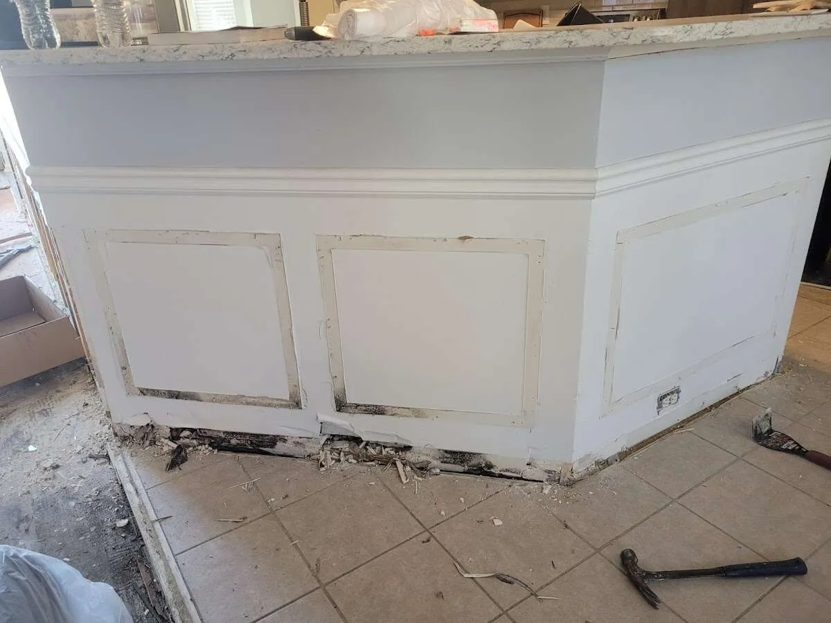 Water damage and mold on kitchen during Storm Damage Restoration in Broussard